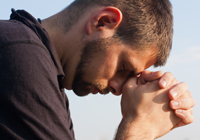 man praying